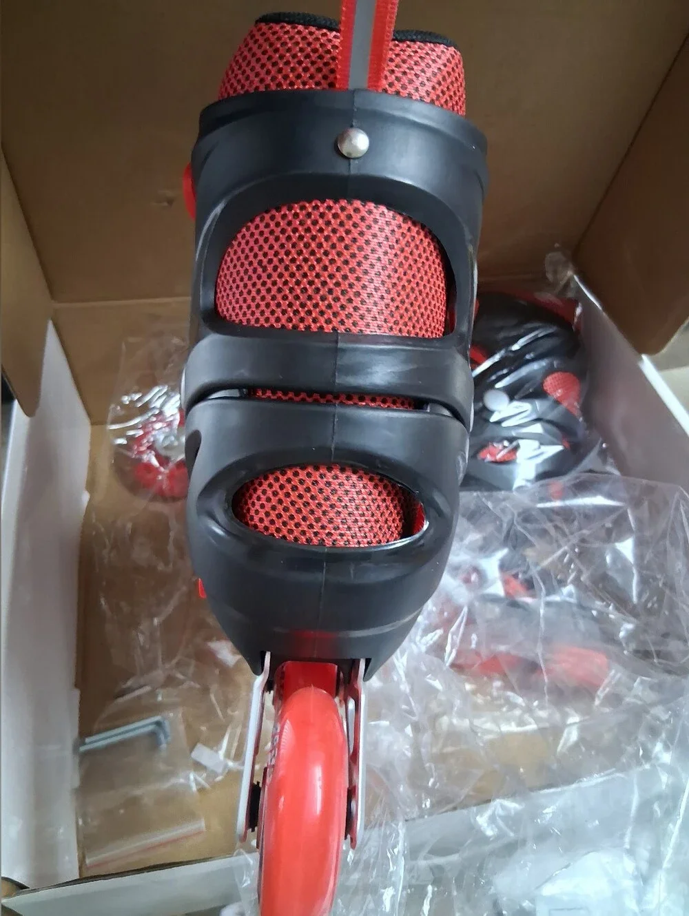 NIB-Youth Red and Black Adjustable Inline Roller Skates